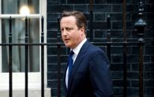 British Prime Minister David Cameron leaves 10 Downing Street in central London after a Cabinet meeting to discuss a response to Syria following chemical attacks that Britain believe were launched by the Syrian regime. 29 August 2013. Picture: Leon Neal/AFP