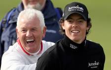 Rory McIlroy and his father Gerry share a joke out on the course. Picture: Official Rory McIlroy Facebook Page.