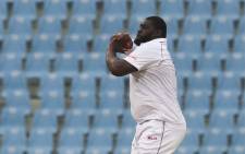 West Indies' Rahkeem Cornwall delivers a ball during the third day of the only cricket Test match between Afghanistan and West Indies at the Ekana Cricket Stadium in Lucknow on 29 November 2019. Picture: AFP.
