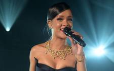 FILE: Recording artist Rihanna performs onstage at The Inaugural Diamond Ball presented by Rihanna and The Clara Lionel Foundation at The Vineyard on 11 December, 2014 in Beverly Hills, California. Picture: AFP.