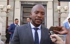 DA Leader Mmusi Maimane addresses the media on the steps of the National Assembly following the delivery of the 2019 Budget speech. Picture: Cindy Archillies/EWN.