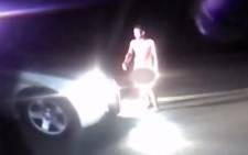 Naked man steals car from cop. Picture: CNN