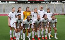 (From L, front) USA's forward Christen Press, USA's defender Crystal Dunn, USA's defender Becky Sauerbrunn, USA's midfielder Rose Lavelle, USA's defender Kelley O'Hara and (From L, Rear) USA's defender Abby Dahlkemper, USA's forward Alex Morgan, USA's goalkeeper Alyssa Naeher, USA's midfielder Lindsey Horan, USA's midfielder Samantha Mewis and USA's forward Tobin Heath pose for a team photo prior to the Tokyo 2020 Olympic Games women's group G first round football match between Sweden and USA at the Tokyo Stadium in Tokyo on July 21, 2021. Picture: Yoshikazu Tsuno / AFP