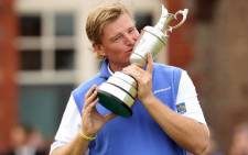 Ernie Els kisses the Claret Jug, 'The Golf Champion Trophy' after winning the 2012 British Open Golf Championship at Royal Lytham and St Annes in Lytham, north-west England. Picture: AFP