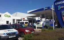 FILE: Police gather at the Engen garage in Gardens following the fatal shooting of Toufieq Joseph on 24 January 2015. Picture: Natalie Malgas/EWN.