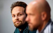 Ajax' Dutch defender Daley Blind (L) and Ajax' Dutch Erik ten Hag (R) attend a press conference in Amsterdam, on 22 October 2019 on the eve of the Uefa Champions League football match between Ajax Amsterdam and Chelsea. Picture: AFP