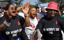FILE: Hundreds of women march in Durban to commemorate National Women's Day 9 August 2002 to remember those who died in the struggle in defeating apartheid. Picture: AFP