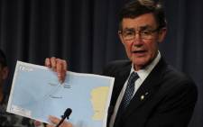 Angus Houston, head of the Joint Agency Coordination Centre leading the search for missing Malaysia Airlines flight MH370, displays a graphic of the search area during a media conference in Perth on 7 April 2014. Picture: AFP.