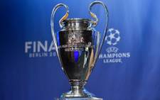 The UEFA Champions League trophy is displayed prior to the draw for the UEFA Champions League semi-final football matches at the UEFA headquarters in Nyon on 24 April, 2015. Picture: AFP.