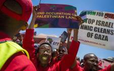 Economic Freedom Fighters (EFF) supporters rally outside the Israel Embassy in Pretoria for a free Palestine protest. Picture: Thomas Holder/EWN.