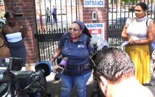 The mother of San Souci Girls' High School addresses the media a day after her daughter was slapped by one of her teachers. Picture: Bertram Malgas/EWN.