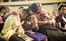 Mourners weep at Lundi Tyamara's memorial service at Grace Bible Church in Soweto. Picture: Thomas Holder/EWN.