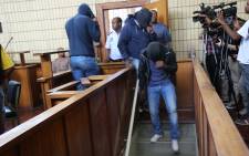 The Krugersdorp Magistrate Court has denied bail to three officers accused of murdering a suspect on 13 November 2015. Picture: Christa Eybers/EWN.