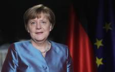 FILE: German Chancellor Angela Merkel poses for a photograph after the recording of her annual New Year's speech at the Chancellery in Berlin on 30 December 2016. Picture: AFP.