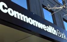 The sign of the Commonwealth Bank is seen at one of its branches in Melbourne on 8 August 2018. Picture: AFP.