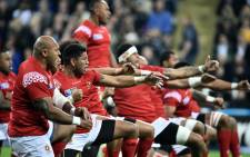 Tonga's players perform the sipi tau prior to a Pool C match of the 2015 Rugby World Cup between New Zealand and Tonga at St James' Park in Newcastle-upon-Tyne, northeast England, on 9 October 2015. Picture: AFP 