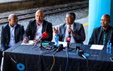 Transport Minister Fikile Mbalula and officials from Prasa briefed the media at Cape Town Train Station on 28 November 2019 after 18 train carriages were destroyed in a fire. Picture: @MbalulaFikile/Twitter