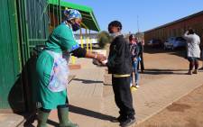 FILE: A pupil receives a meal at Kgato Primary School in Bloemfontein. Picture: Department of Basic Education/Twitter