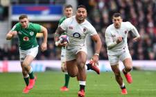FILE: England's centre Manu Tuilagi (C) makes a break during the Six Nations international rugby union match between England and Ireland at the Twickenham, west London, on 23 February 2020. Picture: AFP