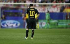 FC Barcelona's Lionel Messi looks dejected after his side's Champions League exit. Picture: AFP.