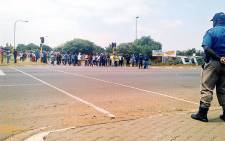 Soweto police have confirmed one person has been arrested after opening fire on protesting residents from the Thembelihle township on 25 February 2015. Picture: @JMPDSafety.