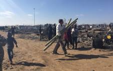FILE: Around 1,500 people have been displaced after the overnight blaze that killed five residents in Plastic View informal settlement. Picture: Dineo Bendile/EWN.