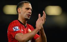 A picture taken on 16 March, 2013 shows Manchester United's English defender Rio Ferdinand leaving the pitch after the English Premier League football match between Manchester United and Reading at Old Trafford in Manchester. Picture: AFP.