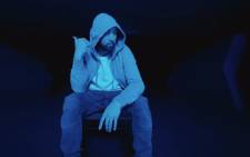 A YouTube screengrab of Eminem in his music video for 'Darkness'.