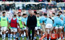 Argentina's Australian coach Michael Cheika (C) talks to the players as they warm up before the series-deciding international rugby union third test match against Scotland at the Madre de Ciudades Stadium in Santiago del Estero, Argentina, on 16 July 2022. Picture: Pablo GASPARINI/AFP