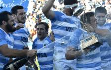 Argentina's Los Pumas celebrate after defeating South Africa's Springboks in a Rugby Championship 2018 test match at Malvinas Argentinas stadium in Mendoza, some 1050km west of Buenos Aires, Argentina on 25 August 2018. Picture: AFP
