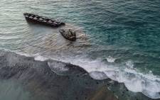 This aerial picture taken on 16 August 2020, shows the 'MV Wakashio' bulk carrier that had run aground and broke into two parts near Blue Bay Marine Park, Mauritius. Picture: AFP