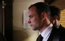 Oscar Pistorius leaves the High Court in Pretoria after the third day of his murder trial on 5 March 2014. Picture: Aletta Gardner/EWN.