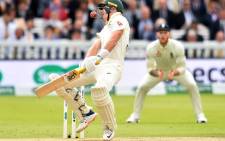 Australia's Marnus Labuschagne reacts as the ball, bowled by England's Jofra Archer (unseen), hits him on the helmet during play on the fifth day of the second Ashes cricket Test match between England and Australia at Lord's Cricket Ground in London on 18 August 2019. Picture: AFP