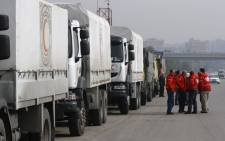 Syrian Red Crescent aid convoys carrying food, medicine and blankets, leave the capital Damascus as they head to the besieged town of Madaya on January 11, 2015.Picture: AFP.