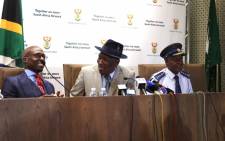 Home Affairs Minister Malusi Gigaba, Police Minister Bheki Cele and National Police Commissioner Lieutenant-General Khehla Sitole hold a press briefing on a significant breakthrough on corruption within the prison and Home Affairs environment. Picture: Christa Eybers/EWN.