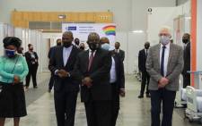 President Cyril Ramaphosais guided by Western Cape Premier Alan Winde on a tour of the province's Hospital of Hope; an 850-bed COVID-19 facility which has been established at the Cape Town International Convention Centre. Picture: @PresidencyZA/Twitter