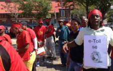 Cosatu members gather in central JHB as they prepare to march over the controversial e-tolls. Picture: Govan Whittles/EWN.