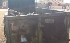 Dumpster where woman’s charred body was found in Mamelodi. Picture: EWN/Mbali Sibanyoni.