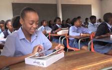 Pupils from Phomolong secondary school in Tembisa will this year be using tablets in the classroom. Picture: Vumani Mkhize/EWN.