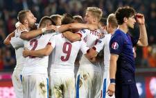 Czech Republic celebrate after beating Netherlands 2-1 in their opening game of the Euro 2016 qualifiers in Prague. Picture: AFP