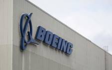 In this file photo taken on March 12, 2019 the Boeing logo is pictured at the Boeing Renton Factory in Renton, Washington. Picture: AFP.