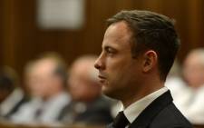 FILE: Oscar Pistorius waits in the dock at the High Court in Pretoria on 21 October 2014. Picture: Pool.