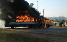 FILE: A bus was set alight and roads blocked in Hammanskraal following service delivery protests in the area. Picture: Arrive Alive.