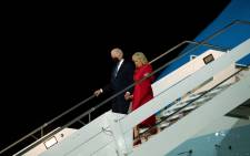 US President Joe Biden (L) and US First Lady Jill Biden disembark from Air Force One upon arrival at Rome Fiumicino International Airport, early on 29 October 2021, in Rome, Italy. Picture: AFP
