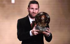 Barcelona's Argentinian forward Lionel Messi reacts after winning the Ballon d'Or France Football 2019 trophy at the Chatelet Theatre in Paris on December 2, 2019. Picture: AFP.