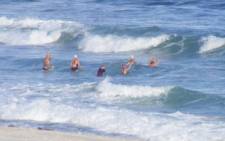 People swimming in one of Cape beaches. Picture: EWN