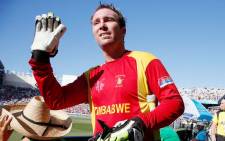 A screengrab of Zimbabwean captain Brendan Taylor as he waves and walks off for the last time in Zimbabwean colours on 14 March 2015. 