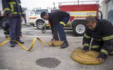 Firefighters prepare for the day ahead. Picture: Thomas Holder/EWN.