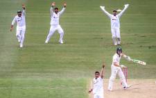 India's Navdeep Saini (L) celebrates after dismissing Australia's Will Pucovski (top R) during the first day of the third cricket Test match between Australia and India at the Sydney Cricket Ground in Sydney on 7 January 2021. Picture: AFP