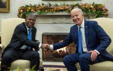 US President Joe Biden shakes hands with Angolan President Joao Lourenco during a meeting in the Oval Office of the White House in Washington, DC, on 30 November 2023. Picture: AFP